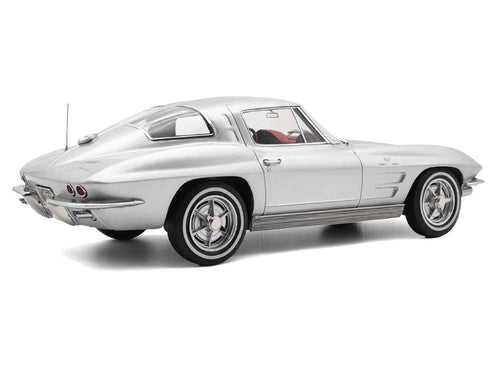 1963 Chevrolet Corvette Sting Ray Sebring Silver Metallic with Red Interior 1/18 Diecast Model Car by Norev